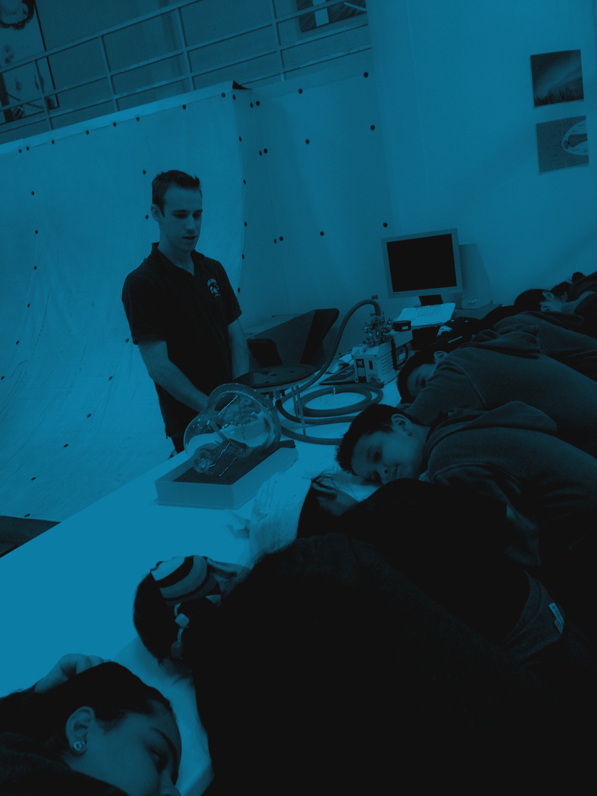 MAP² Explorers students at a science demonstration, duotone