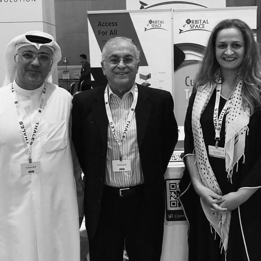 Nada Alshammari at the World Space Forum with Dr. Bassam Alfeeli, GM of Orbital Space, and Dr. Charles Elachi, former director of NASA's Jet Propulsion Laboratory