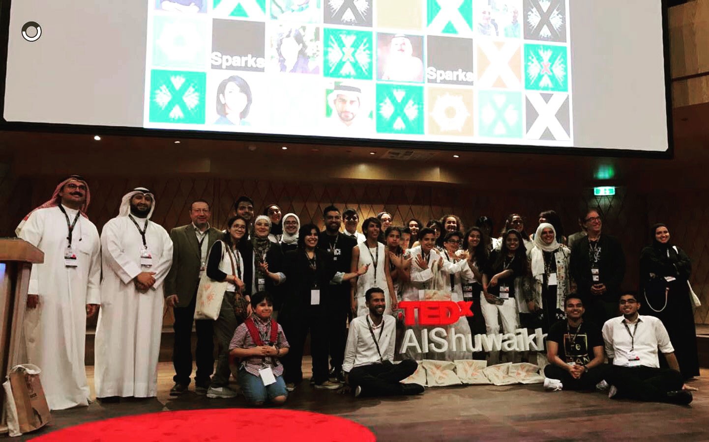 TEDxKuwaitCity group at the sponsor wall
